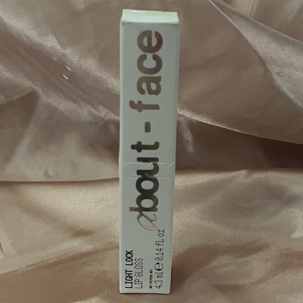 About Face Light Lock Lipgloss unopened and full size in Payton